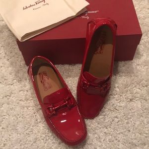 Red patent leather ferragamo loafers.